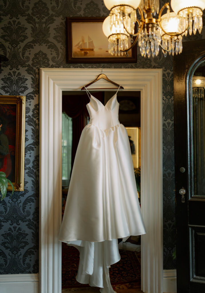 dress hanging up in doorway